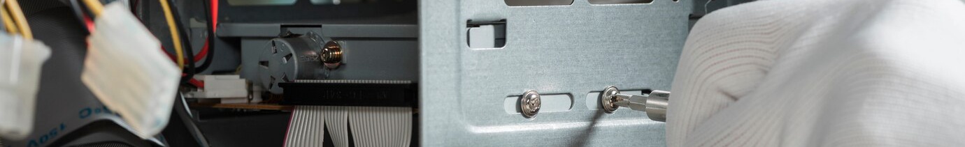 1ae6eb32-4df2-4839-b079-2cad36470659-close-up-male-technician-hand-wearing-gloves-fixing-screw-computer-slot_23-2147922398.jpg
